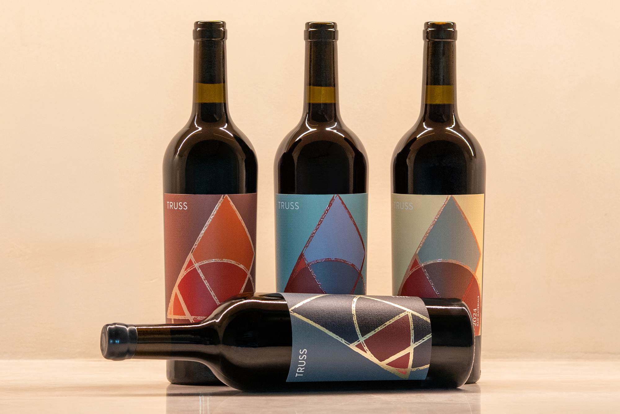 high scoring wine and wine bottles on clean backdrop